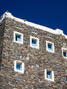 18 House facades with white windows