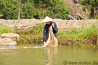 11 Woman fishing with net in Yen river